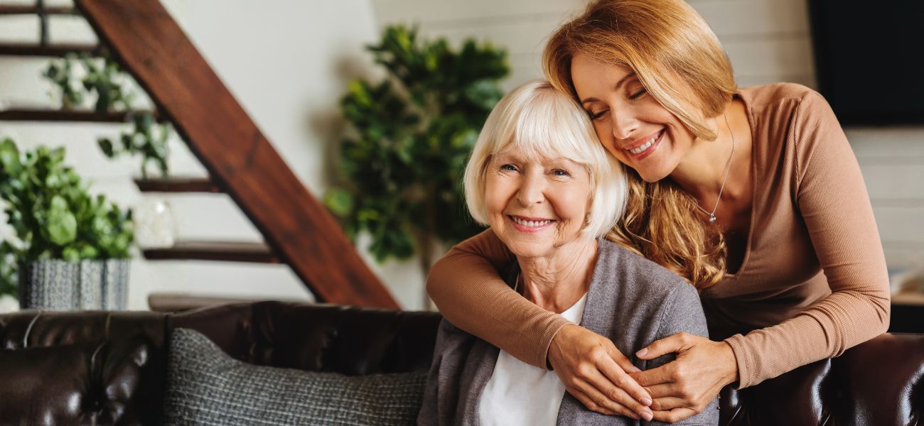 older woman and daughter manco hero 1300x600
